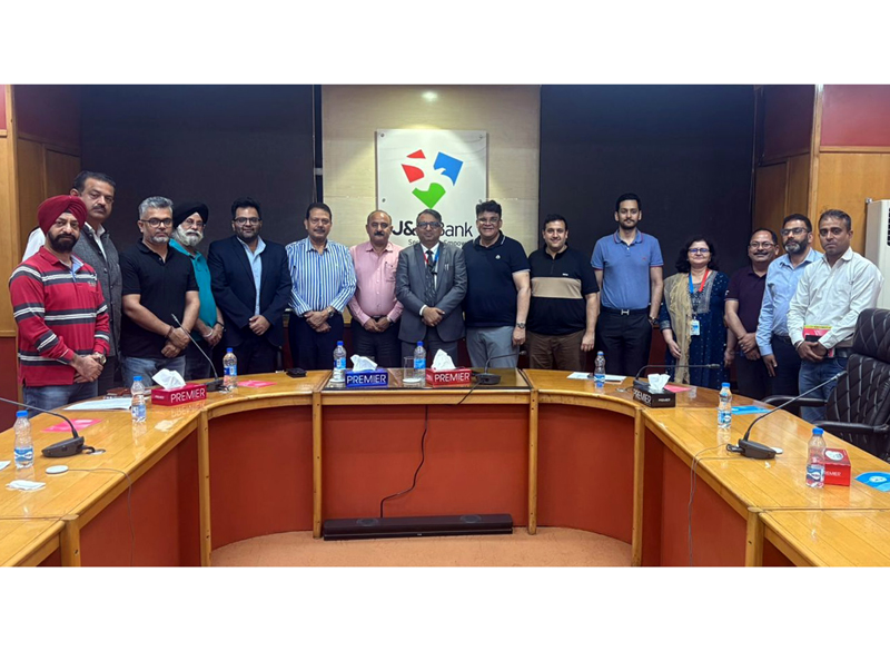 Dignitaries from J&K Bank with representatives of leading automobile dealerships during an interaction programme in Jammu on Saturday. 