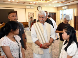 LG interacting with guests during Sikkim Statehood Day celebration at Lok Bhavan, Srinagar on Saturday.