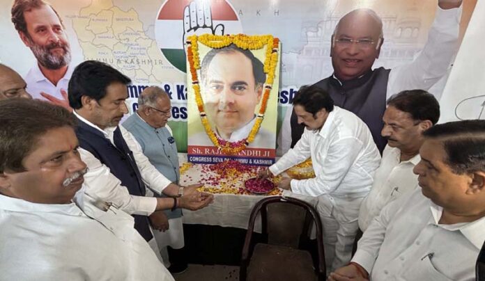 Cong leaders paying tribute to former Prime Minister Rajiv Gandhi during a function in Jammu. -Excelsior/Rakesh Cong leaders paying tribute to former Prime Minister Rajiv Gandhi during a function in Jammu. -Excelsior/Rakesh