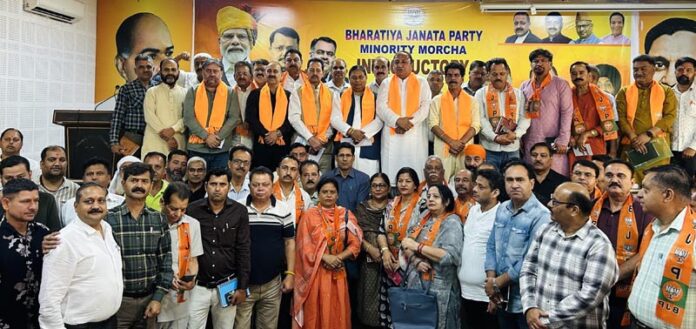 MP (Rajya Sabha) Sat Sharma along with others posing for a group photograph in Jammu.