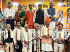 BJP leaders and prominent personalities during the Foundation Day function of Nanaji Deshmukh Library at party office, Trikuta Nagar on Friday.