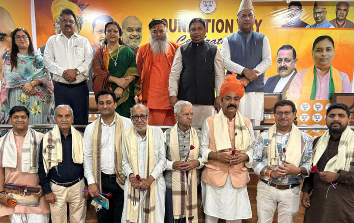 BJP leaders and prominent personalities during the Foundation Day function of Nanaji Deshmukh Library at party office, Trikuta Nagar on Friday.