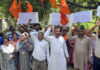 Municipal Workers staging a protest in Jammu on Friday. -Excelsior/Rakesh
