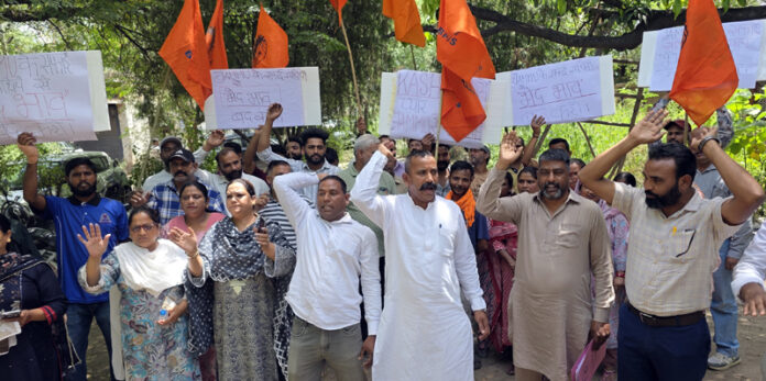 Municipal Workers staging a protest in Jammu on Friday. -Excelsior/Rakesh