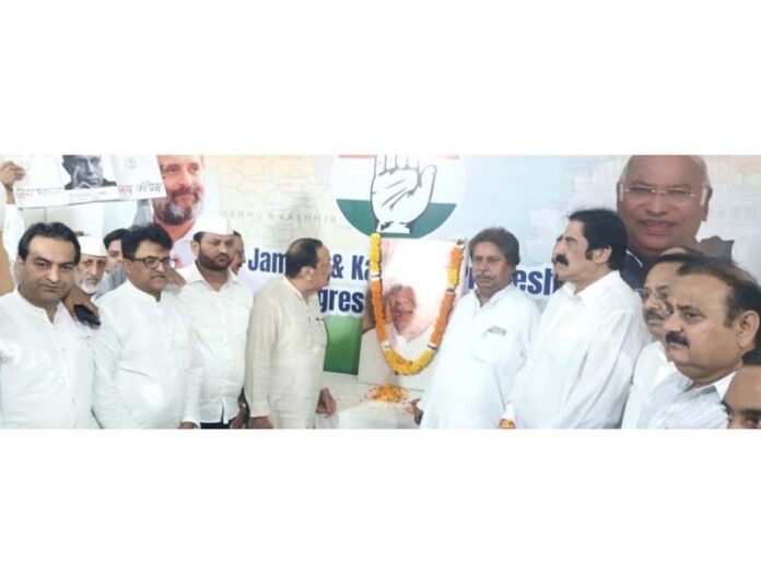Cong leaders and workers paying tribute to Pt J L Nehru on his death anniversary in Jammu.