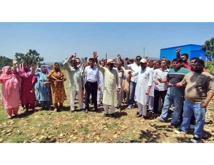MLA Jasrota, Rajiv Jasrotia leading a protest in Ghati on Saturday. -Excelsior/Pardeep