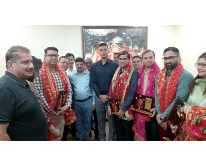 Dy Commissioner, Dr Rakesh Minhas, CCI president Arun Gupta and others during disease screening camp in Jammu on Saturday. Dy Commissioner, Dr Rakesh Minhas, CCI president Arun Gupta and others during disease screening camp in Jammu on Saturday.
