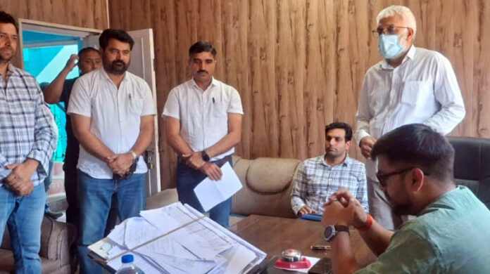 DC Rajouri inspecting office of XEN REW on Tuesday.