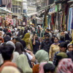 Shoppers throng markets in large numbers ahead of Eid Shoppers throng a local market in Srinagar on Tuesday. -Excelsior/Shakeel