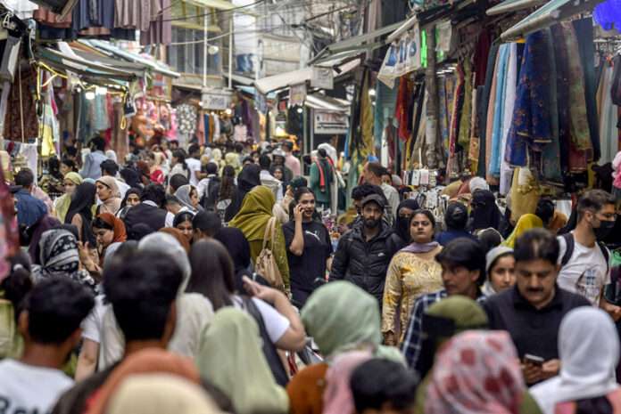 Shoppers throng a local market in Srinagar on Tuesday. -Excelsior/Shakeel Shoppers throng a local market in Srinagar on Tuesday. -Excelsior/Shakeel