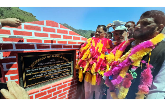 Minister Javed Rana launching a development project in Mendhar on Sunday.