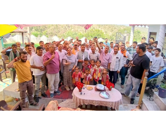 MLA Dr Bharat Bhushan posing along with villagers during a public darbar in Kathua. MLA Dr Bharat Bhushan posing along with villagers during a public darbar in Kathua.