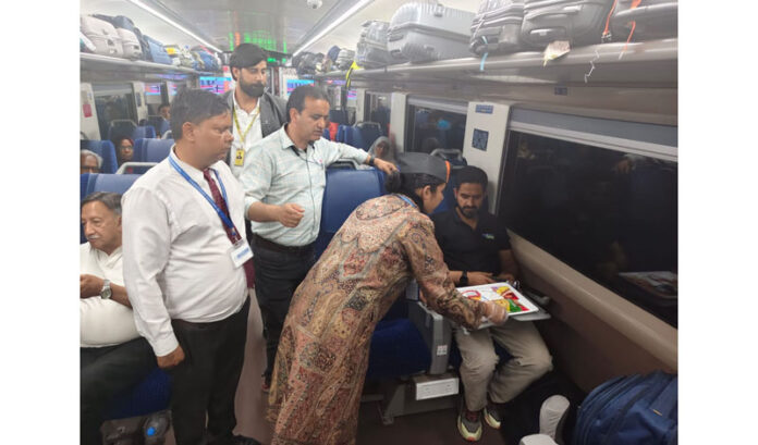 Officials from Jammu Division offering services to the Vande Bharat passengers.