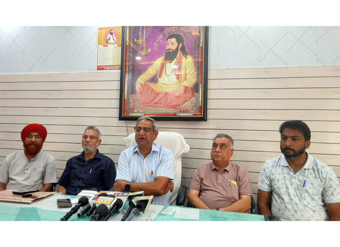 Members of Shri Guru Ravi Dass Sabha during press briefing in Jammu on Thursday.