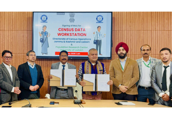 CPCO Amit Sharma and Vice-Chancellor of Ladakh University displaying copies of MoU signed by them. CPCO Amit Sharma and Vice-Chancellor of Ladakh University displaying copies of MoU signed by them.