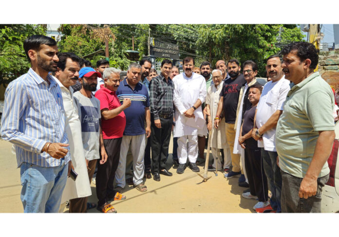 MLA Jammu West, Arvind Gupta during inauguration of newly constructed lane and drain in Ward 13 on Saturday.