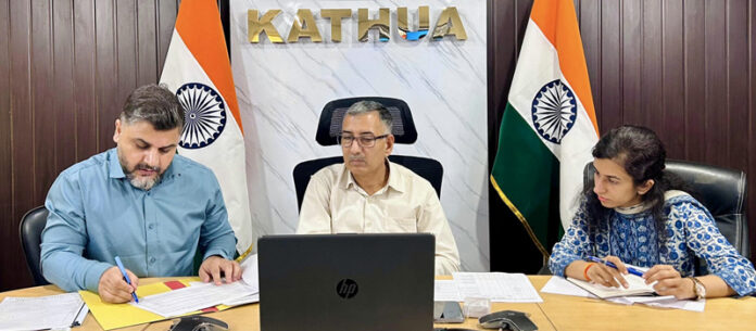 DC Kathua chairing a meeting on Tuesday.