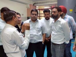 Director FCS&CA Rajesh Kumar Shavan interacting with employees at Basholi.