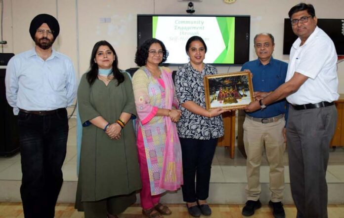 Dignitaries during an event organised by SMVDU's School of Business near Katra.