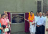 MLA R S Pathania unveiling a foundation stone at Majalta.