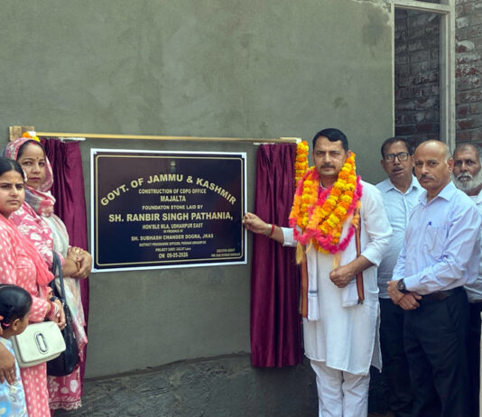 MLA R S Pathania unveiling a foundation stone at Majalta.