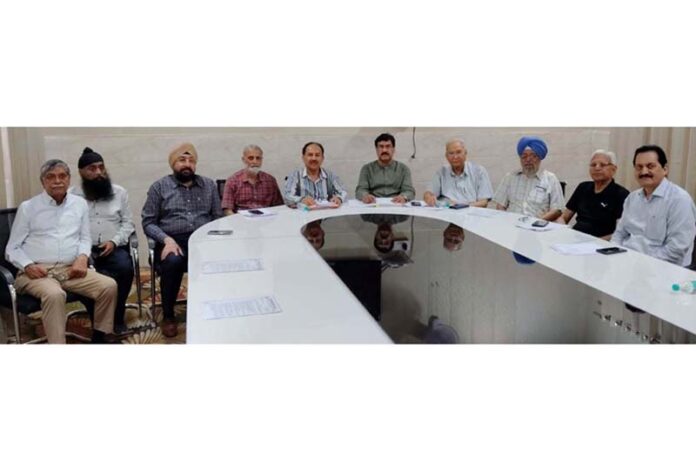 Members of Executive Committee of Home for the Aged & Infirm during a meeting in Jammu on Friday.