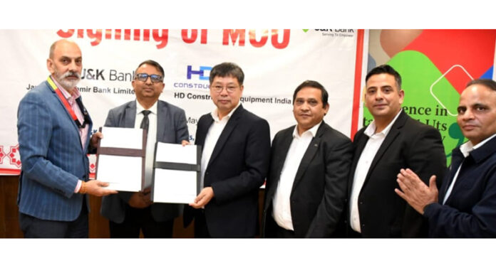 Officers of J&K Bank and HD Construction Equipment India during signing of MoU on Thursday. Officers of J&K Bank and HD Construction Equipment India during signing of MoU on Thursday.
