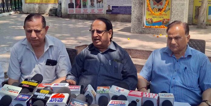 SBAJCT chairman, Surinder Bhagat addressing a press conference in Jammu on Friday. -Excelsior/Rakesh