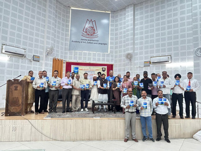 Dignitaries releasing a Dogri book in Jammu.