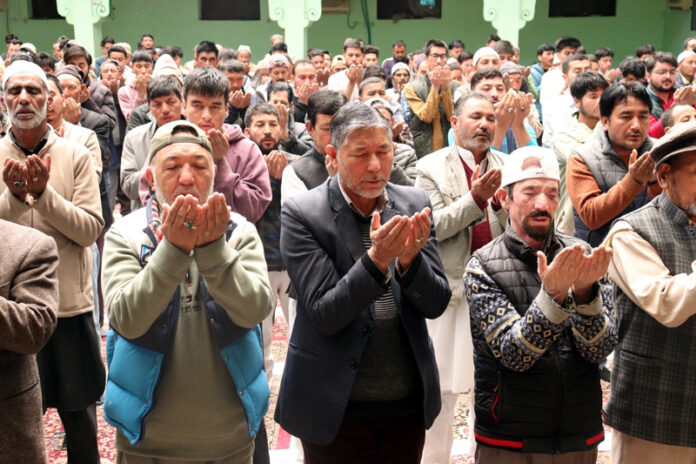 Muslims offering Eid-ul-Adha prayers at Hawza-e-Ilmiyah Isna Asharia, Kargil. -Excelsior/Basharat Ladakhi Muslims offering Eid-ul-Adha prayers at Hawza-e-Ilmiyah Isna Asharia, Kargil. -Excelsior/Basharat Ladakhi