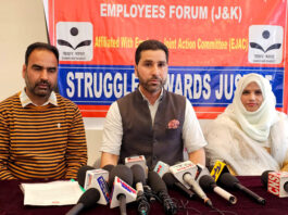 Members of Saakshar Bharat Employees Association during a press conference in Srinagar on Thursday. -Excelsior/Shakeel