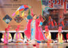 An artist performing during a function in Jammu.