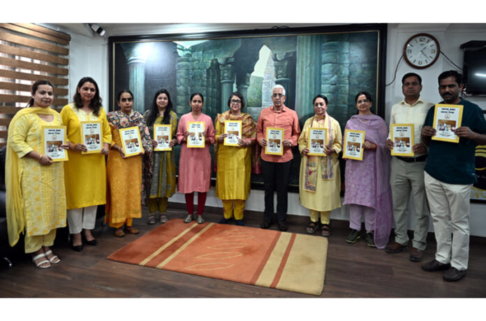 JU VC and others releasing brochure of Commerce Dept.