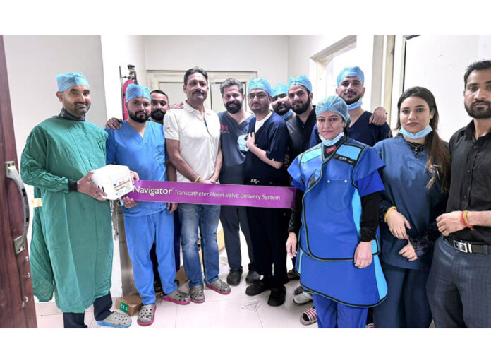 Dr Nikhil Mahajan posing with his team after performing TAVI procedure at KD Hospital, Jammu. Dr Nikhil Mahajan posing with his team after performing TAVI procedure at KD Hospital, Jammu.