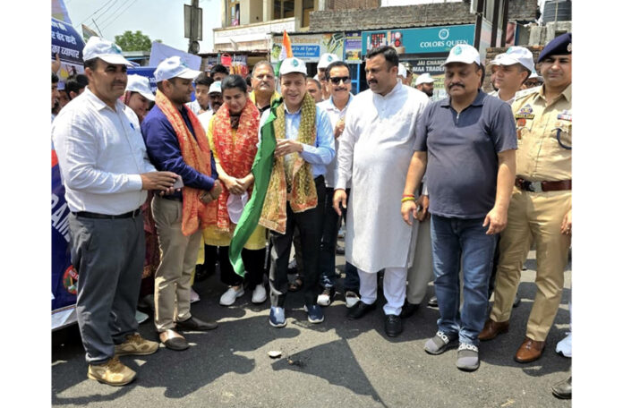 CEO Sanjeev Verma flagging off a rally in Jammu.