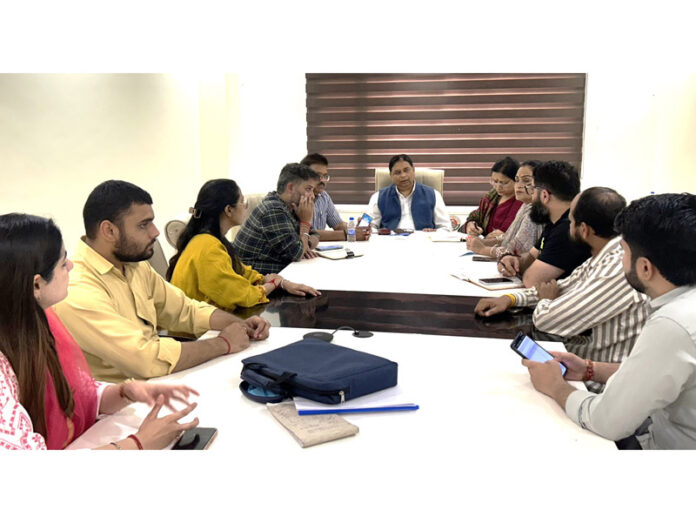 J&K BJP president and MP, Sat Sharma chairing a meeting of Social Media and IT Departments at Jammu on Saturday.