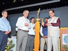 Vice-Chancellor of SKUAST-Jammu lighting ceremonial lamp during inaugural of 3-day AGM of AICRP (Seeds).