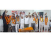 Congress leaders on dais during public meeting at Jourian.