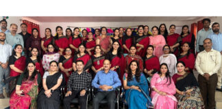 Delhi Public School Nagbani faculty members posing along with resource persons during a programme.