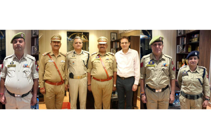 Newly promoted GRP Jammu personnel with senior officers posing for a photograph at SSP GRP Jammu office.