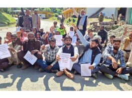 Villagers staging protest in Budhal area of Rajouri on Thursday. -Excelsior/Imran