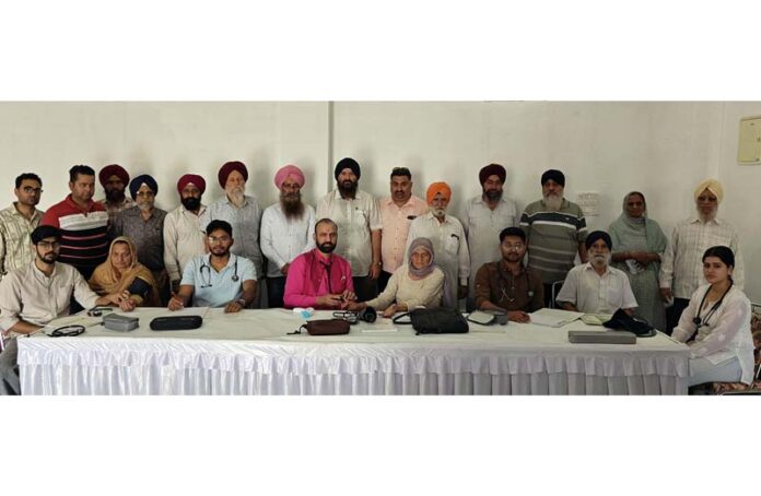Dr Sushil Sharma, HoD Cardiology GMC Jammu and his team during a health check-up camp at Gadigarh, Jammu.
