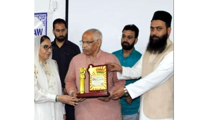BJP gen secy, Ashok Koul being felicitated during a function at Budgam on Tuesday.