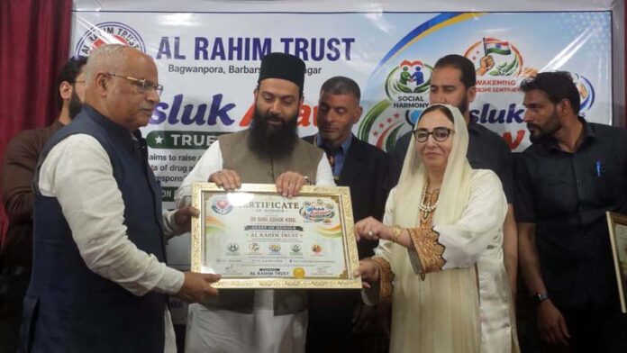 A participant being felicitated during an awareness prog at Srinagar.