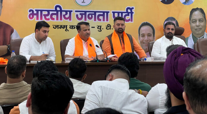 Rakesh Mahajan, vice president BJP chairing a meeting of BJYM at Jammu on Friday.
