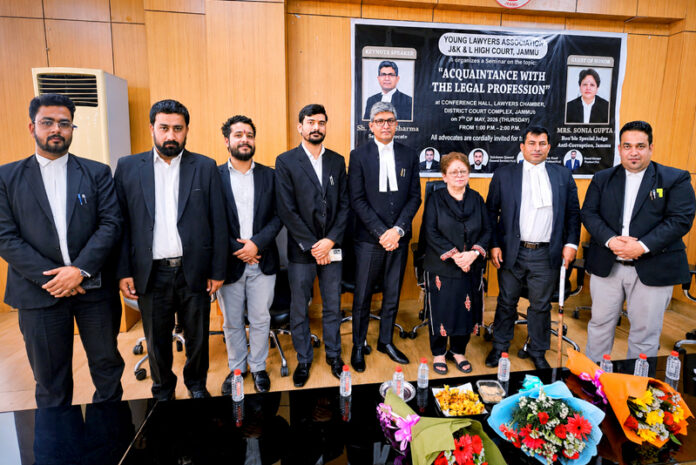 Members of Young Lawyers Association posing with Sonia Gupta (Special Judge, Anti-Corruption, Jammu) during a seminar.
