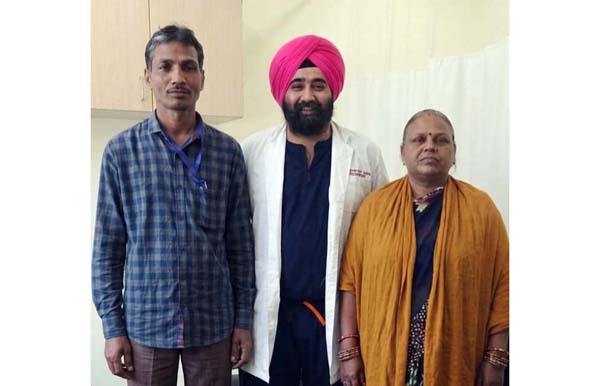 Dr Khushwant Singh, Consultant Neurosurgery at SMVD Narayana Hospital posing with a patient and her attendant. Dr Khushwant Singh, Consultant Neurosurgery at SMVD Narayana Hospital posing with a patient and her attendant.