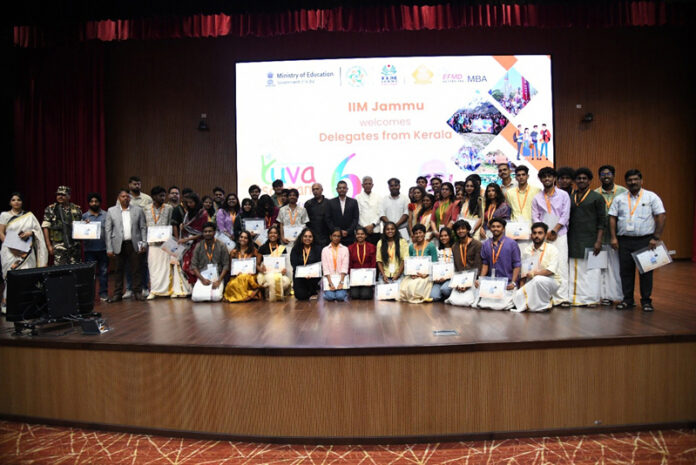 Visiting delegates displaying participation certificates at the valedictory ceremony of Yuva Sangam Phase 6 at IIM Jammu.