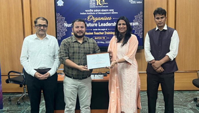 One of the participants being awarded certificate during valedictory of leadership programme at IIM Jammu. One of the participants being awarded certificate during valedictory of leadership programme at IIM Jammu.