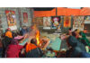 Devotees performing Pooja at Samadhi of Swami Mirzakak at village Hangalgund, Anantnag on Sunday.